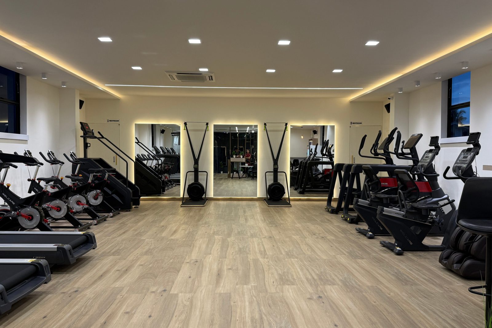 The cardio wing — treadmills, ellipticals, recumbent bikes