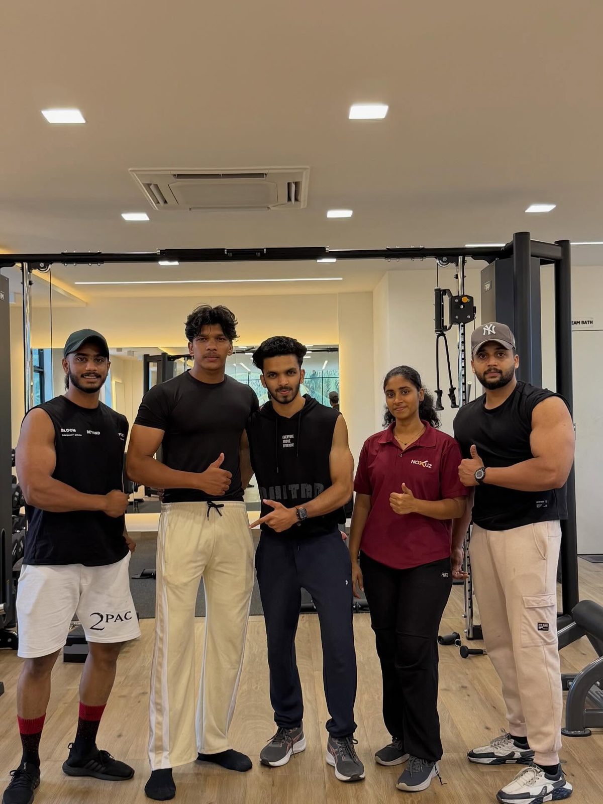 The NOXUZ coaching team and members on the training floor in Calicut